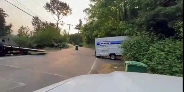 Cyclists Fall Like Skittles Through A Rope Stretched On The Road