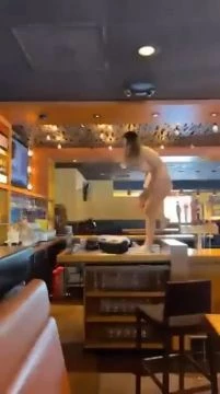 Nude Woman Destroys Restaurant