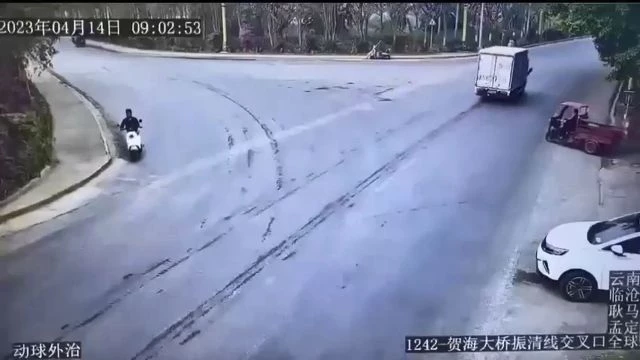 A Woman On A Motorcycle Is Smeared On The Road By An Overturned Cement Truck