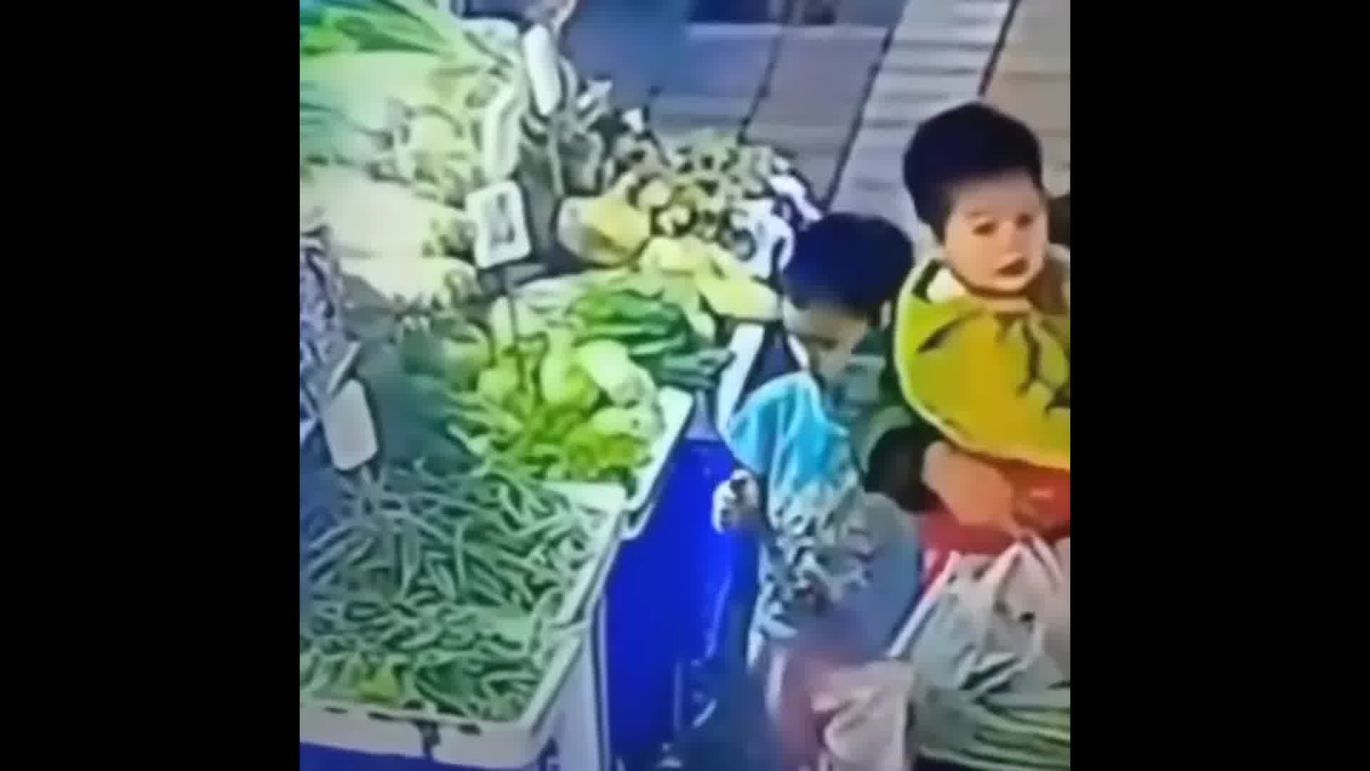 A Boy Playing With A Lighter Set Fire To A Street Vendor's Stall