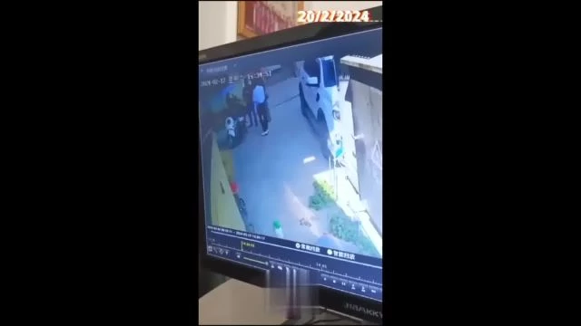 A Chinese Couple Get Shot In Front Of Their House