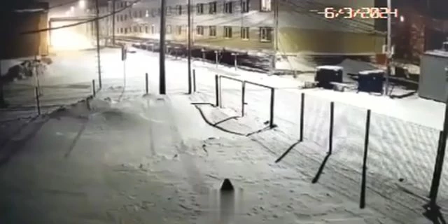 Two Guys Racing On Snowskies On The Road What Could Go Wrong