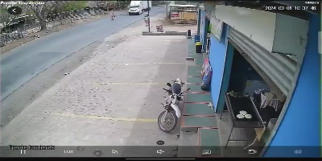 Jocoro, El Salvador. Motorcyclist vs Big Truck