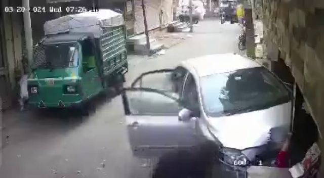 An Out-Of-Control Car Crushes A Woman Against The Wall Of A Building