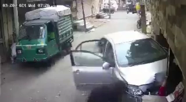 An Out-Of-Control Car Crushes A Woman Against The Wall Of A Building