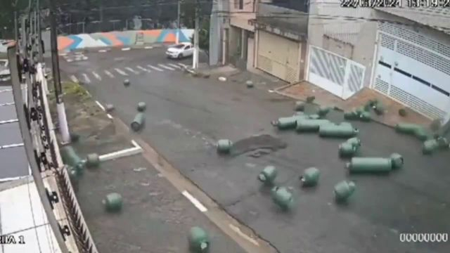 Liquefied Petroleum Gas Cylinders Fall Off Truck And Roll Downhill