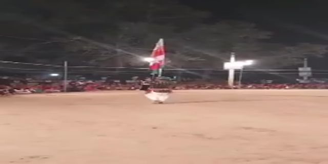 Dancer Carrying Massive Flag Gets Fatally Zapped When Flag Touches Power Line