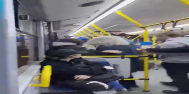 A Crowd Of Teenagers Beats Up A Man On The Bus. Russia