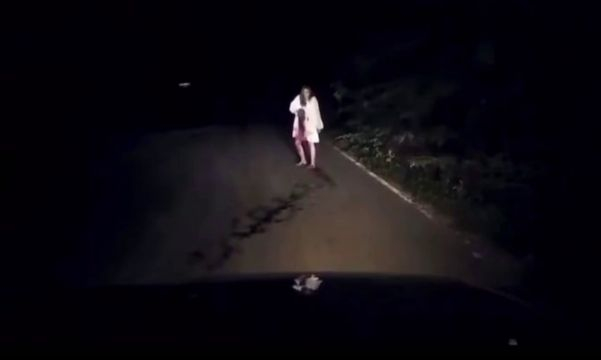 A Woman On A Night Road Sticks A Knife In Herself