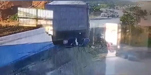 A Huge Truck Crushed Two People On A Motorcycle