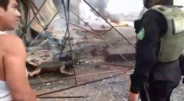 The Slightly Charred Body Of A Fire Victim. Peru