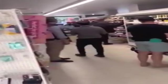 Sainsbury's Employees Kick A Caught Shoplifter
