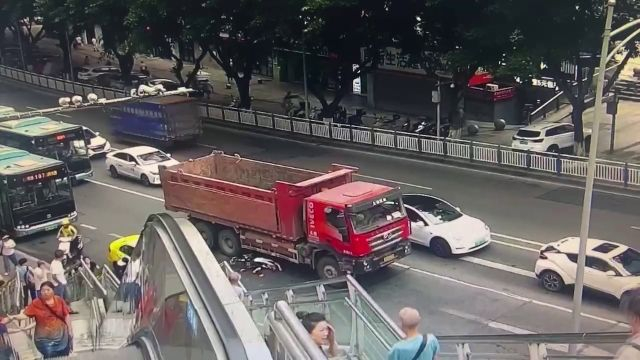 A Motorcyclist Caught In The Truck's Blind Spot Is Crushed