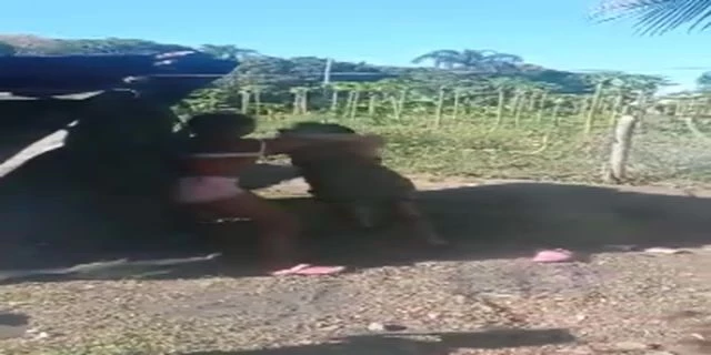 A Fight Between A Mother And Her Daughter. The Dominican Republic