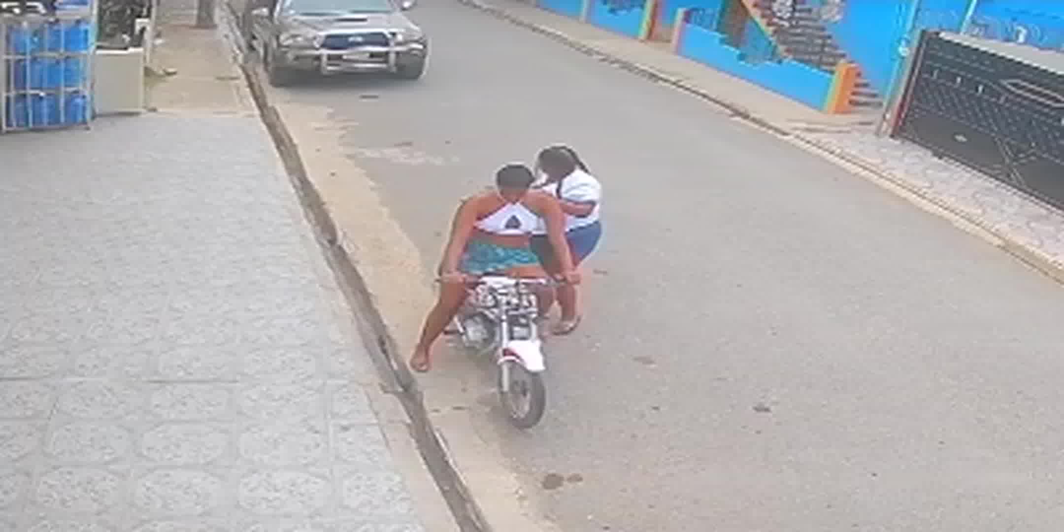 A Man Attacked A Woman On A Motorcycle. Reasons For Aggression Are Unknown