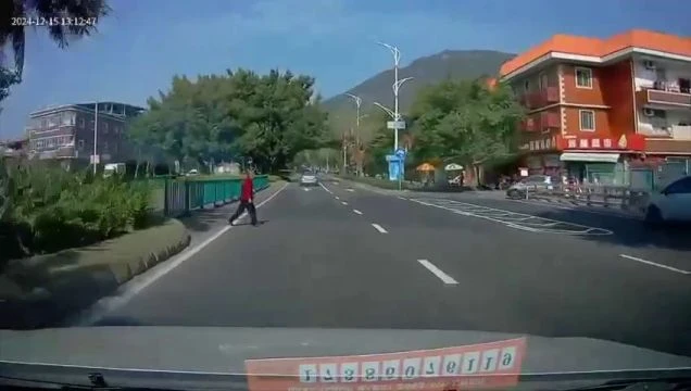 Elderly Woman Is Hit By Car While Crossing The Road. China