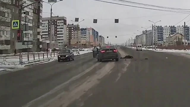 A Woman Driving A BMW Hit A 90-Year-Old Woman At A Pedestrian Crossing. Chelyabinsk, Russia