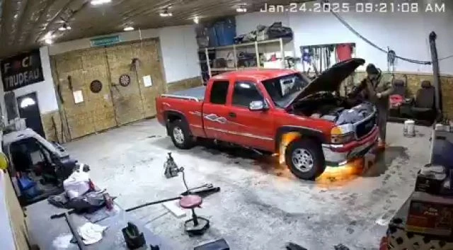 Man Carries Out Maintenance Work In Own Garage